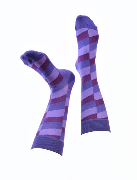 A pair of socks in multiple purple colours in a diamond pattern